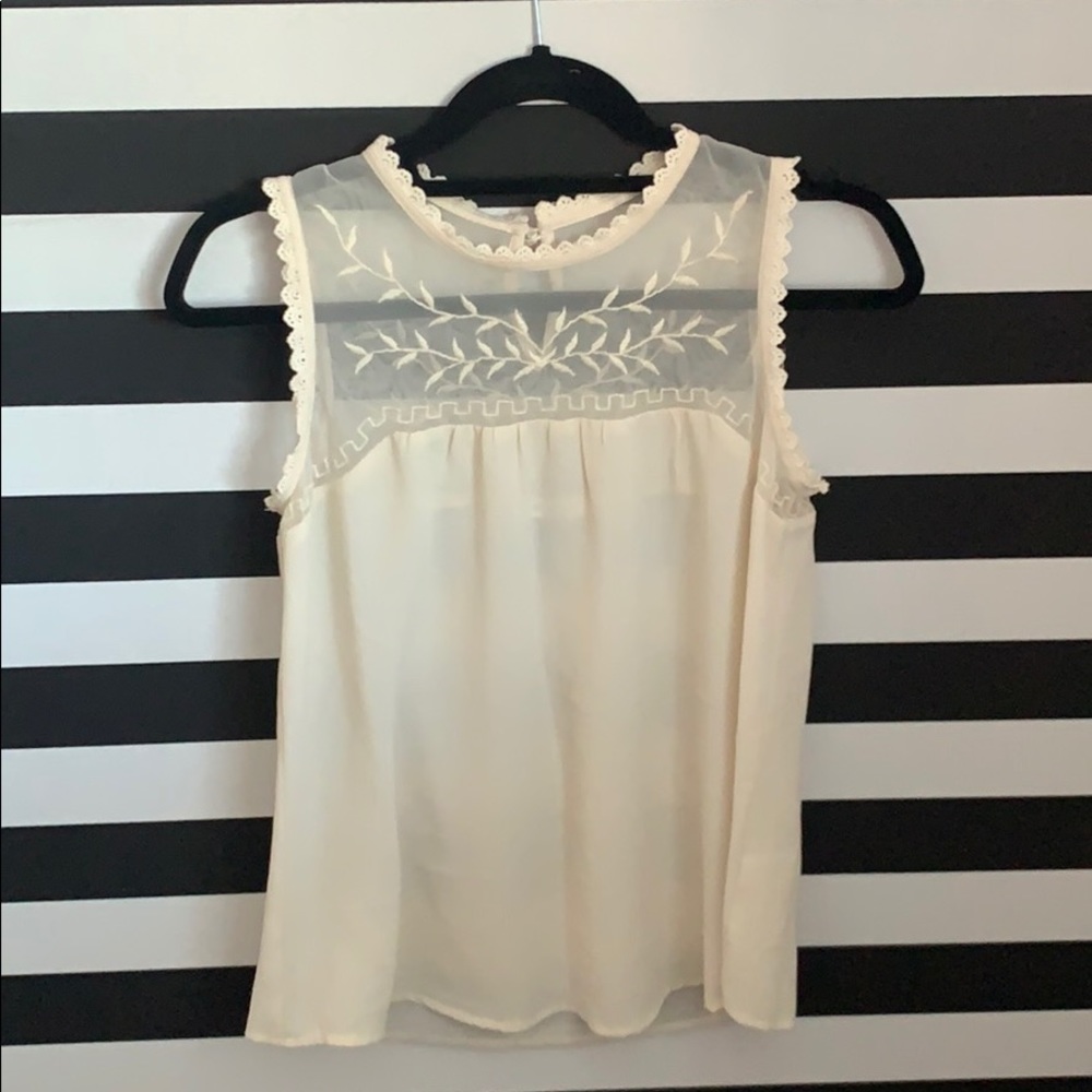 A never worn off white shirt.